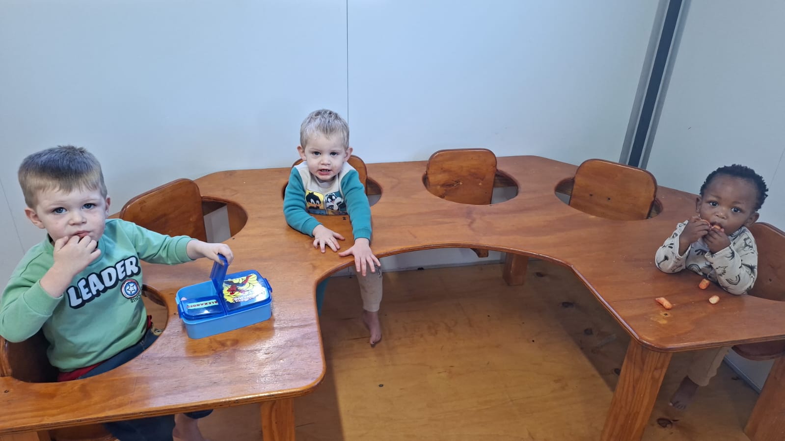 Little ones at the snack table